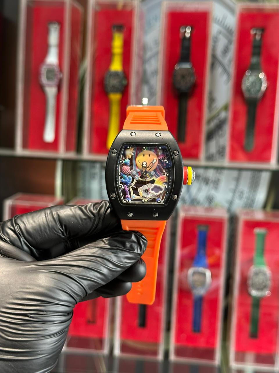 RM Smile in Black Dial & Orange Strapes